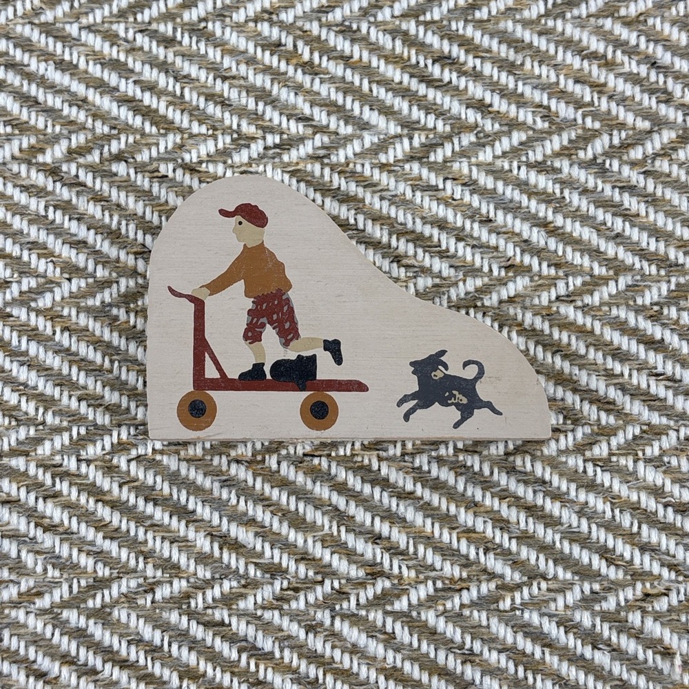 The Cats Meow Village "Boy & Dog Scootering" Wooden Accessory Shelf Sitter